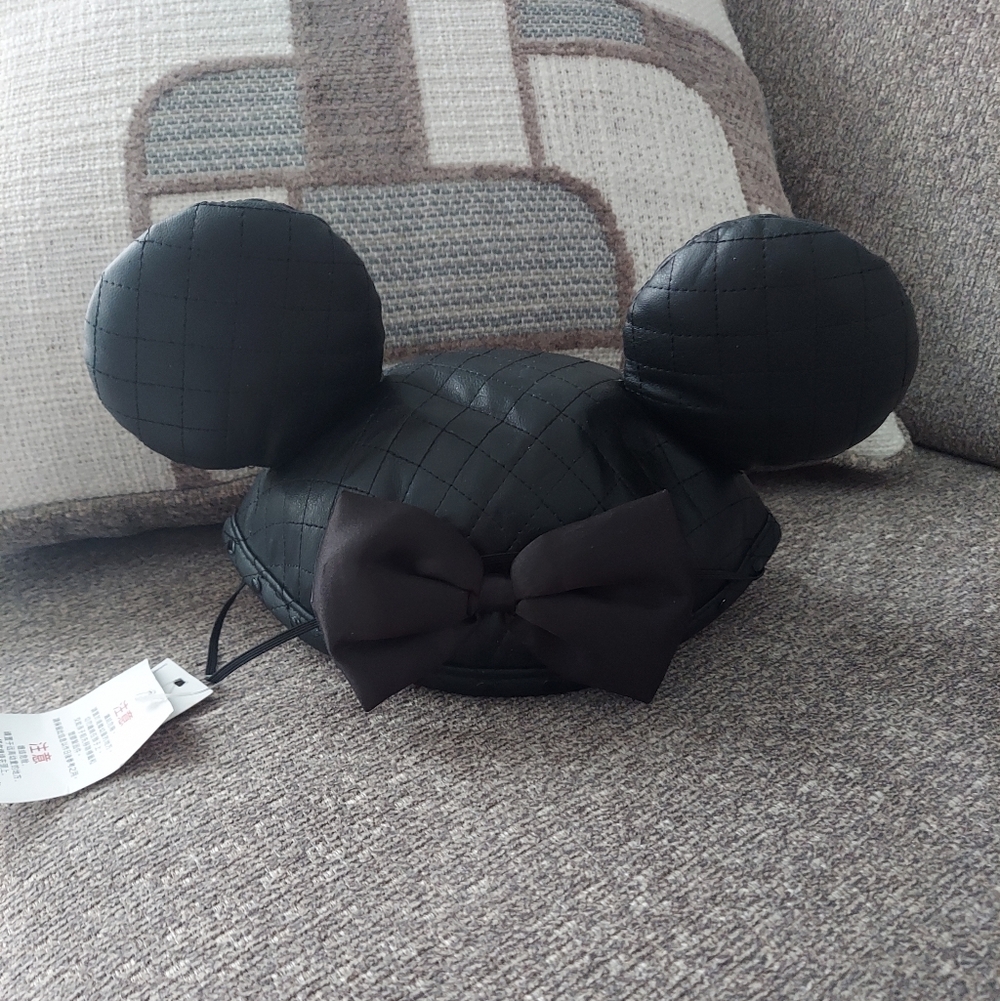 Disney black quilted Minnie mouse ears with bow. Brand new with tags